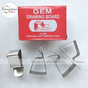 Metal drawing clip for holding papers securely.